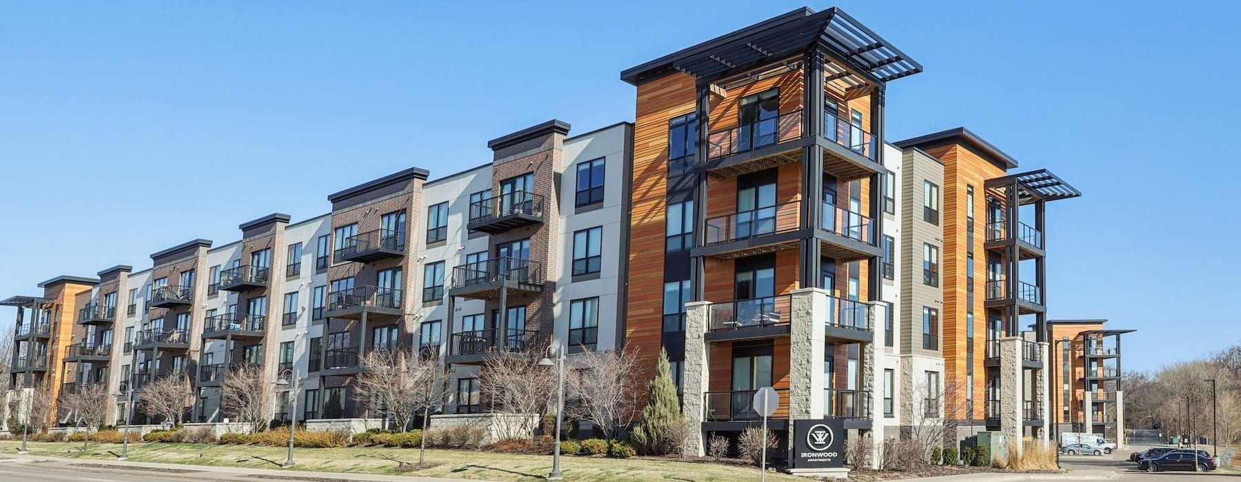 an apartment building with a road